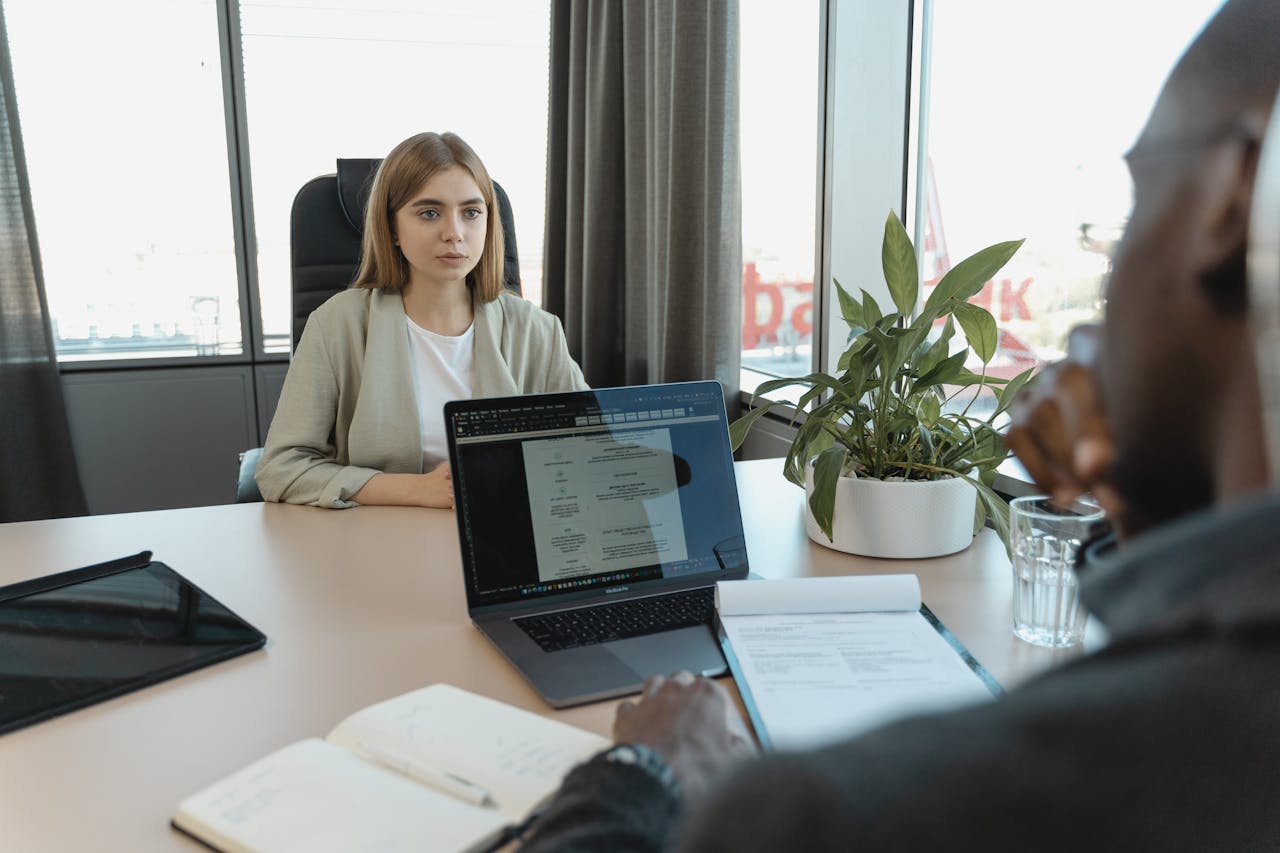 A professional job interview scene in a modern office setting, emphasizing recruitment and career opportunities.